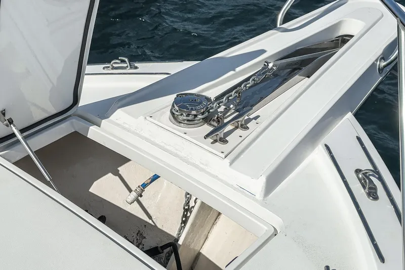 Whiplash II Yacht Photos Pics 2006 Hatteras 50 Convertible yacht anchor system on deck, featuring chain and winch.