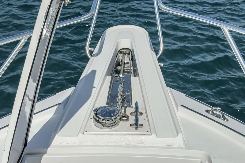 Whiplash II Yacht Photos Pics Bow of 2006 Hatteras 50 Convertible yacht with anchor chain and ocean view.