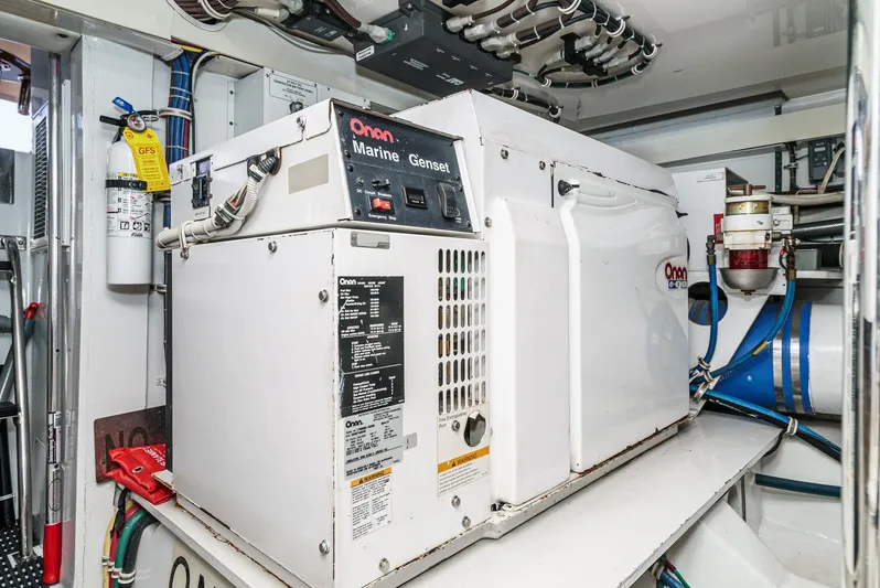 Whiplash II Yacht Photos Pics Onan marine generator in 2006 Hatteras 50 Convertible engine room.