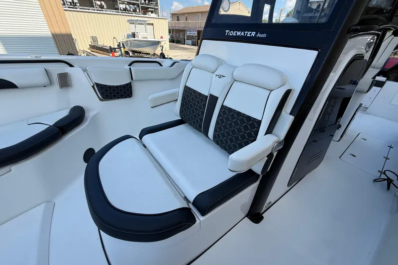  Yacht Photos Pics 2022 Tidewater 292 CC Adventure boat interior with stylish seating and modern design.