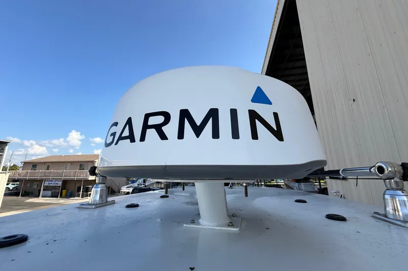  Yacht Photos Pics Garmin radar on 2022 Tidewater 292 CC Adventure boat under clear blue sky.