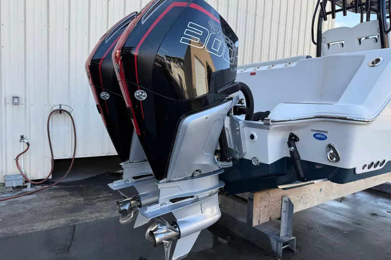  Yacht Photos Pics 2022 Tidewater 292 CC Adventure boat with dual powerful outboard engines.