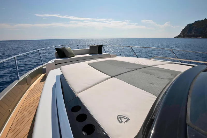  Yacht Photos Pics Luxurious 2026 FIM 500 Regina yacht deck with sunbathing area, ocean view.
