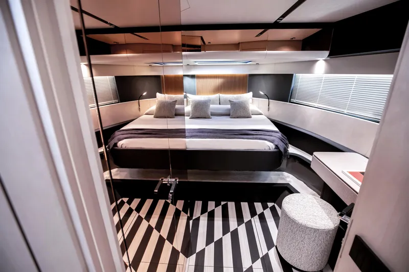  Yacht Photos Pics Luxurious bedroom interior of 2026 FIM 500 Regina yacht with modern design elements.