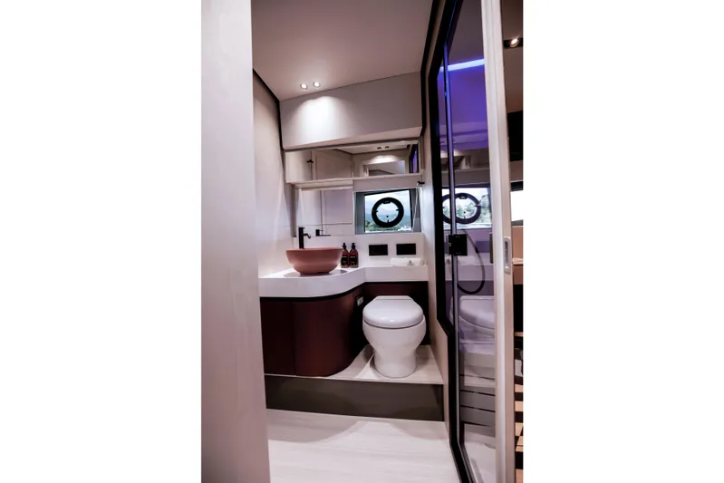  Yacht Photos Pics Luxurious bathroom interior of 2026 FIM 500 Regina yacht with modern fixtures.
