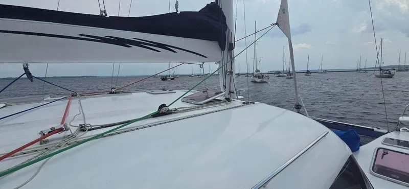 Bellagio Yacht Photos Pics Sailing on a 2013 Kelsall Suncat 40 catamaran in a calm harbor.