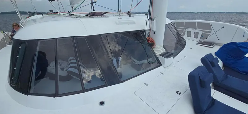 Bellagio Yacht Photos Pics Kelsall Suncat 40 catamaran, 2013 model, featuring spacious deck and panoramic windows on open water.