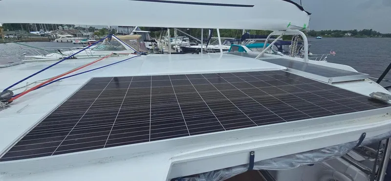Bellagio Yacht Photos Pics Solar panels on 2013 Kelsall Suncat 40 catamaran, docked at marina.