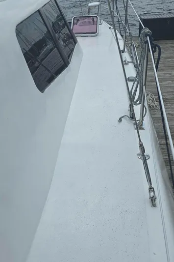 Bellagio Yacht Photos Pics Kelsall Suncat 40 sailboat deck, 2013 model, docked by the water.