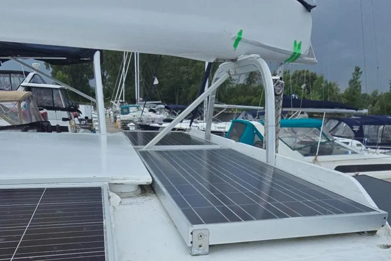 Bellagio Yacht Photos Pics Kelsall Suncat 40 catamaran with solar panels, docked in a marina, 2013 model.