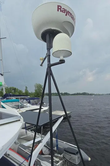 Bellagio Yacht Photos Pics Radar equipment on a 2013 Kelsall Suncat 40 catamaran docked by a lake.