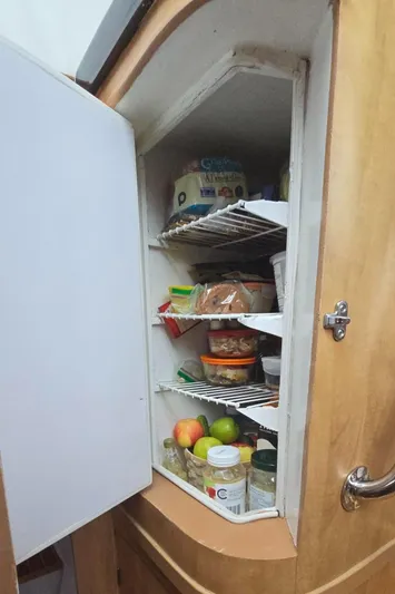 Bellagio Yacht Photos Pics Refrigerator inside 2013 Kelsall Suncat 40 yacht, stocked with food and beverages.