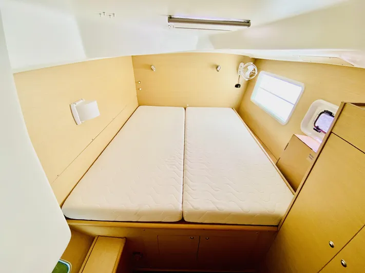 Finally Found Yacht Photos Pics Interior cabin of 2014 Lagoon 380 S2 catamaran with double bed and window.