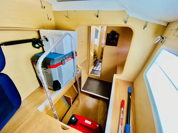 Finally Found Yacht Photos Pics Interior of 2014 Lagoon 380 S2 yacht, featuring storage area and modern equipment.