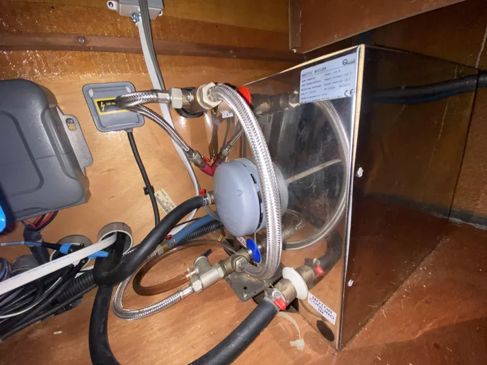 Finally Found Yacht Photos Pics Under-sink plumbing and wiring in a 2014 Lagoon 380 S2 yacht.