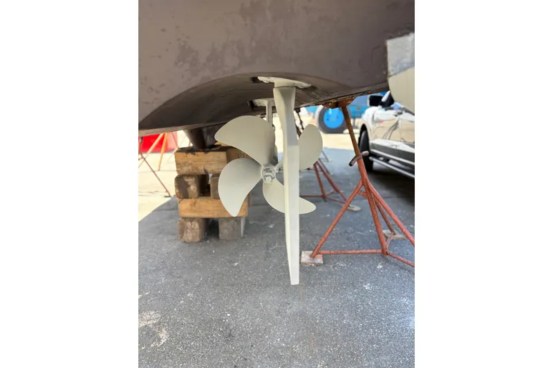  Yacht Photos Pics Propeller of 2005 Meridian 368 Motoryacht on dry dock, supported by stands.