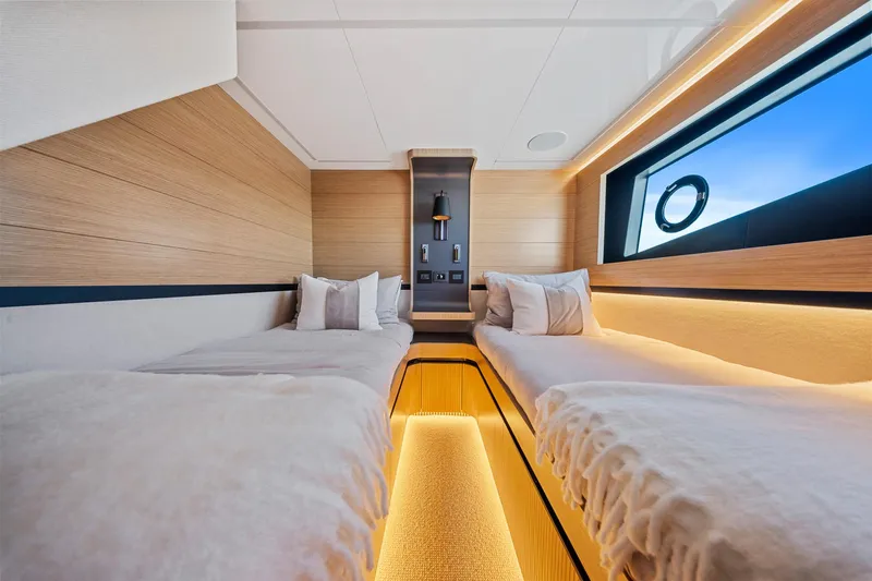 2023 Pearl 62 Luxury Yacht Yacht Photos Pics Luxurious twin cabin interior of 2023 Pearl 62 yacht with modern design and ambient lighting.