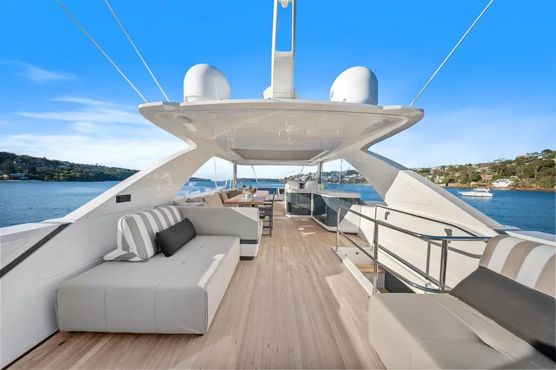 2023 Pearl 62 Luxury Yacht Yacht Photos Pics Luxurious 2023 Pearl 62 yacht deck with elegant seating and scenic ocean view.