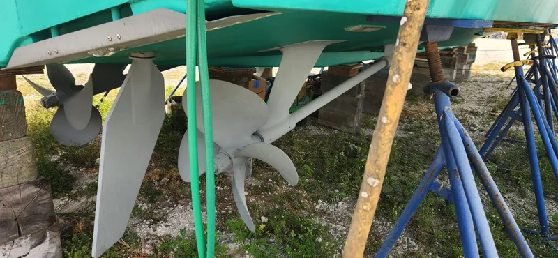  Yacht Photos Pics Propellers and underbody of a 2004 Viking 52 Convertible boat on dry dock.