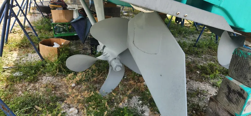  Yacht Photos Pics Propeller and rudder of a 2004 Viking 52 Convertible boat on dry dock.