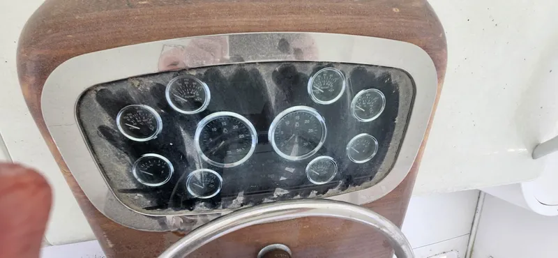  Yacht Photos Pics Dashboard of a 2004 Viking 52 Convertible boat with multiple gauges.