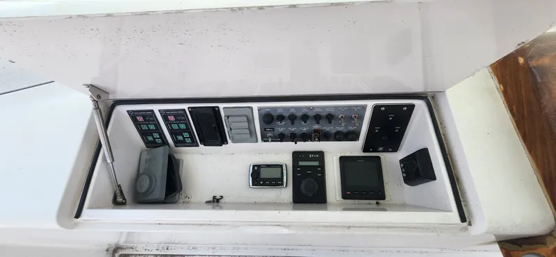  Yacht Photos Pics Control panel of a 2004 Viking 52 Convertible yacht with various instruments.