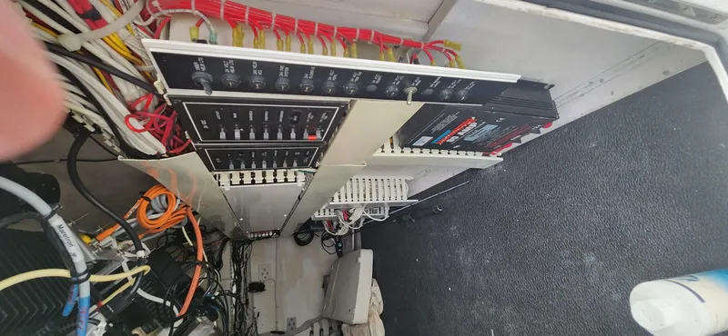  Yacht Photos Pics Electrical panel and wiring inside a 2004 Viking 52 Convertible yacht.