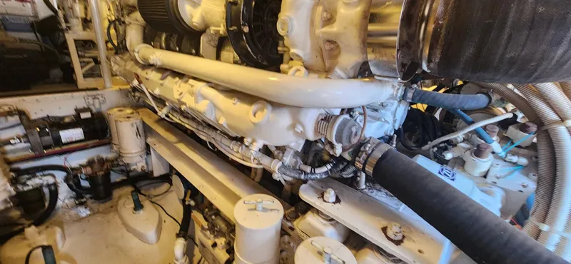  Yacht Photos Pics Engine room of a 2004 Viking 52 Convertible yacht showing detailed machinery.