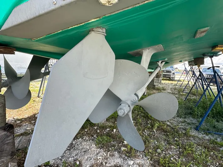  Yacht Photos Pics Close-up of 2004 Viking 52 Convertible boat propeller and rudder.