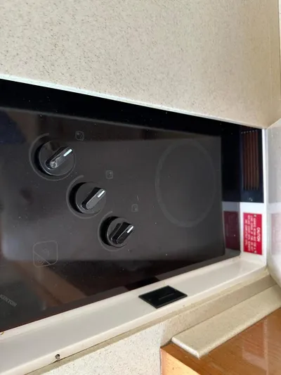  Yacht Photos Pics Control panel of a 2004 Viking 52 Convertible yacht.