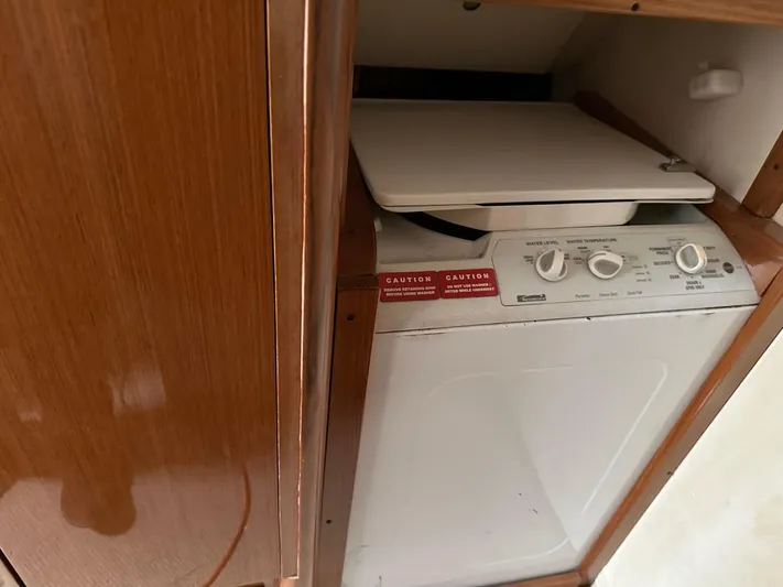  Yacht Photos Pics Built-in washer and dryer unit in 2004 Viking 52 Convertible yacht.