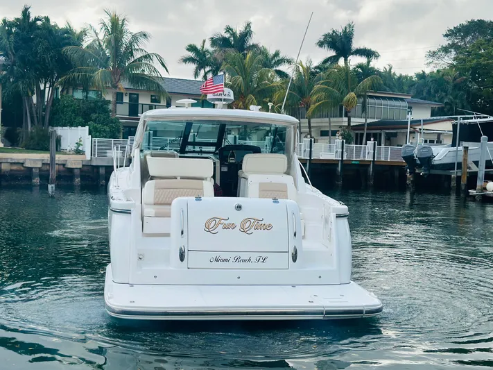  Yacht Photos Pics 2005 Tiara Yachts 3600 Sovran docked in Miami Beach, FL, with palm trees in background.