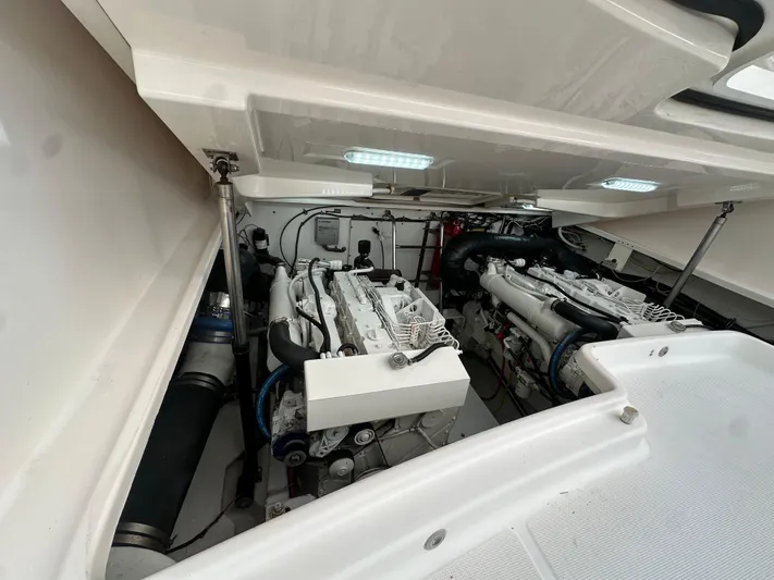  Yacht Photos Pics Engine compartment of 2005 Tiara Yachts 3600 Sovran, showcasing dual engines and clean layout.