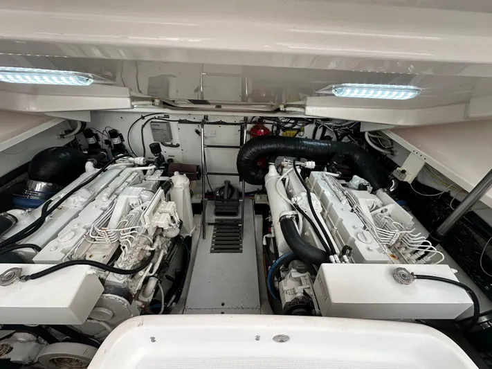  Yacht Photos Pics Engine room of 2005 Tiara Yachts 3600 Sovran, showcasing dual engines and mechanical components.
