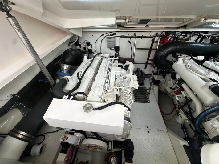  Yacht Photos Pics Engine room of 2005 Tiara Yachts 3600 Sovran, showcasing dual engines and mechanical components.