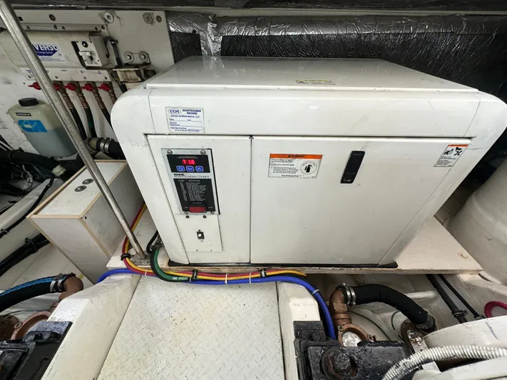  Yacht Photos Pics 2005 Tiara Yachts 3600 Sovran engine room with generator and wiring.