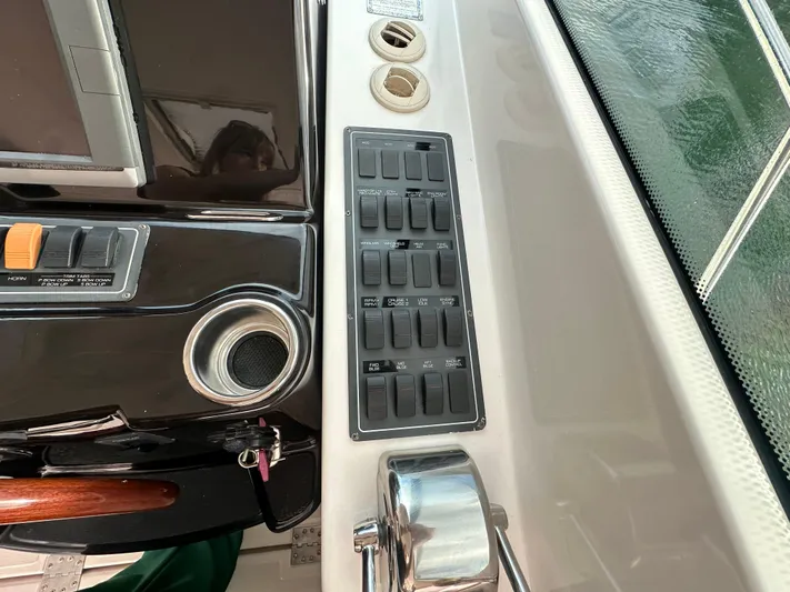  Yacht Photos Pics Control panel of 2005 Tiara Yachts 3600 Sovran with switches and cup holder.