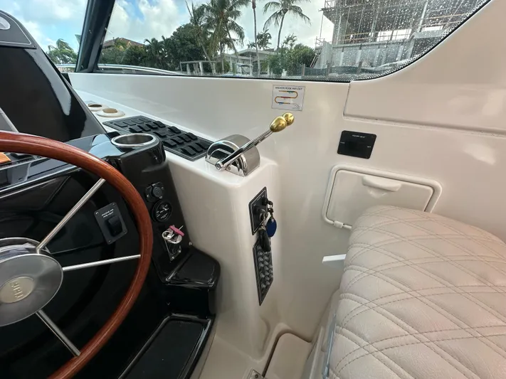  Yacht Photos Pics 2005 Tiara Yachts 3600 Sovran helm with steering wheel and controls.