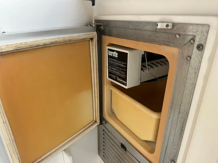  Yacht Photos Pics Ice maker inside 2005 Tiara Yachts 3600 Sovran, open door view.