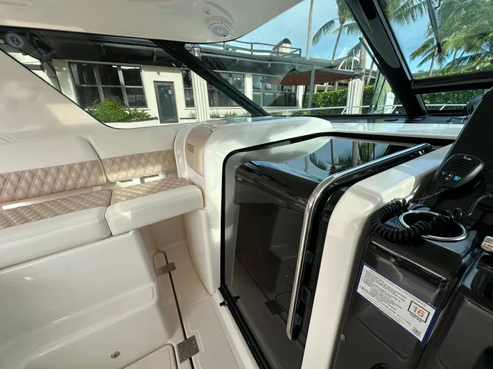  Yacht Photos Pics 2005 Tiara Yachts 3600 Sovran interior with plush seating and modern controls.