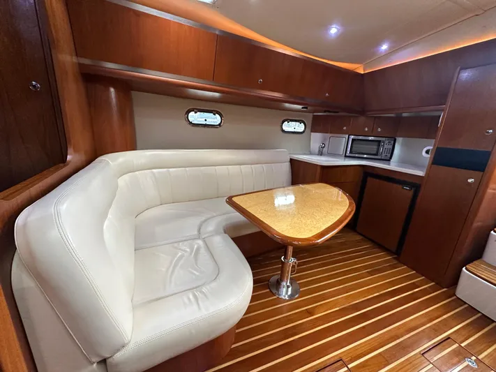  Yacht Photos Pics Luxurious 2005 Tiara Yachts 3600 Sovran interior with elegant seating and modern kitchen amenities.