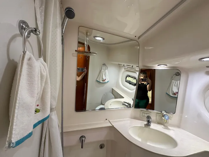  Yacht Photos Pics Bathroom interior of 2005 Tiara Yachts 3600 Sovran with mirror and sink.