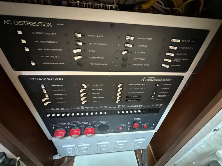  Yacht Photos Pics Electrical panel of 2005 Tiara Yachts 3600 Sovran, showing AC and DC distribution controls.