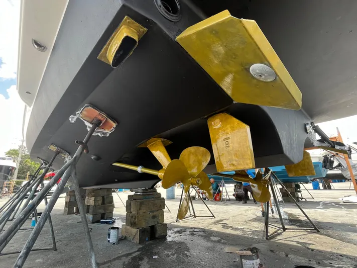  Yacht Photos Pics 2005 Tiara Yachts 3600 Sovran under maintenance, showcasing propellers and hull details.