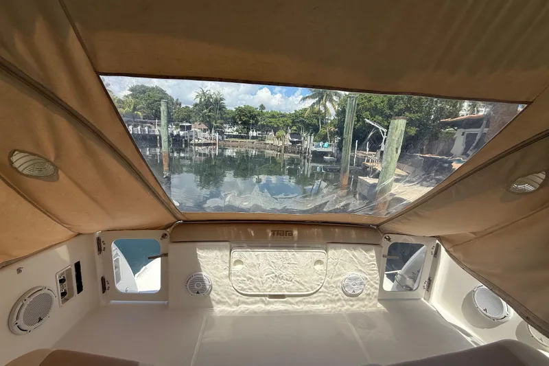  Yacht Photos Pics 2005 Tiara Yachts 3600 Sovran interior view with water and dock in background.