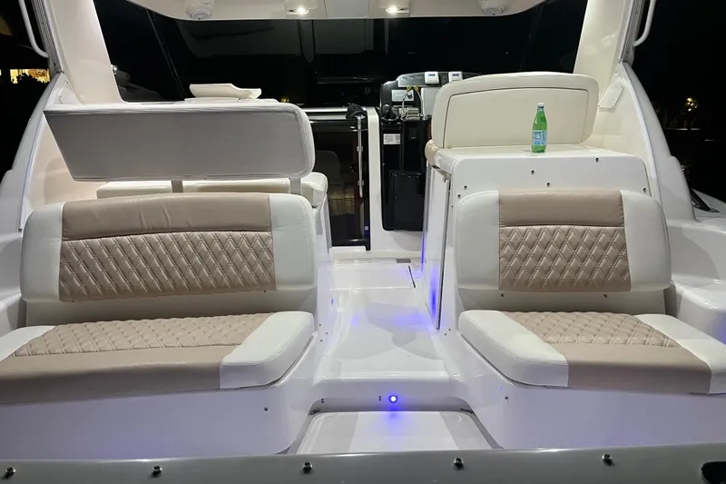  Yacht Photos Pics Luxurious interior of 2005 Tiara Yachts 3600 Sovran with elegant seating and ambient lighting.