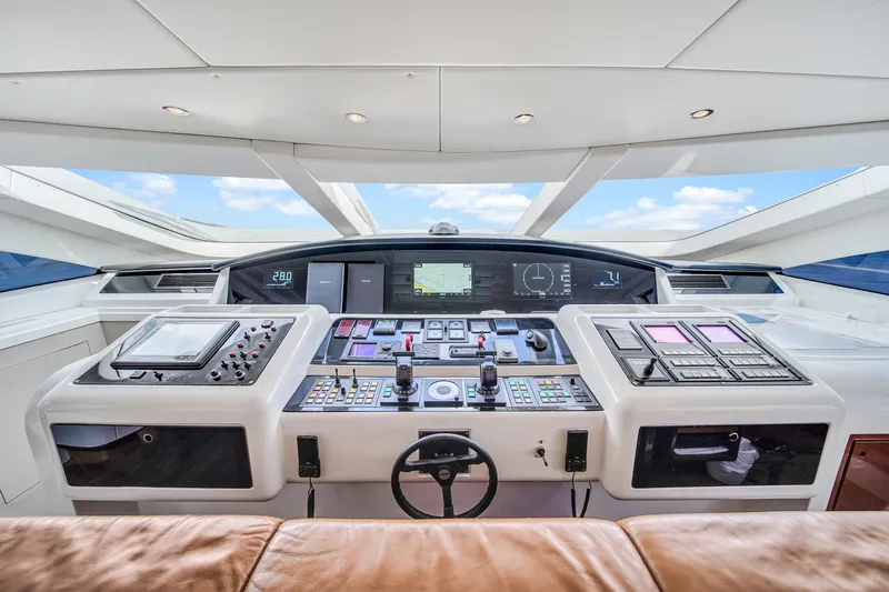  Yacht Photos Pics Control panel of 2002 Mangusta 108 yacht with modern navigation equipment.