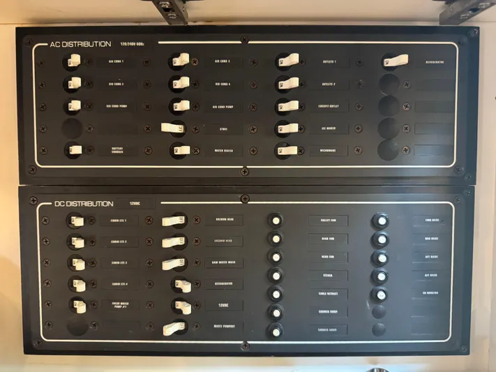 T 2 Yacht Photos Pics Electrical panel on a 2006 Tiara Yachts 4300 Sovran, showing AC and DC distribution.