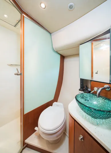 T 2 Yacht Photos Pics Luxurious 2006 Tiara Yachts 4300 Sovran bathroom with modern glass sink and shower.