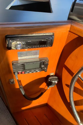 Paradosi Yacht Photos Pics 1990 Nova 4500 boat dashboard with radio and control panel.